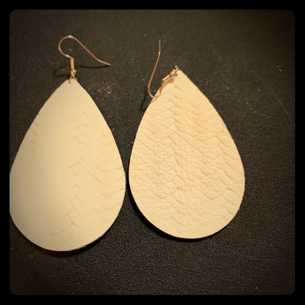 Large leather earnings